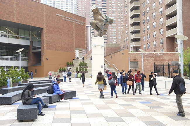 students walking acrpss campus