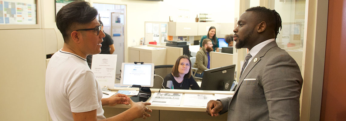 two people talking in Career Center