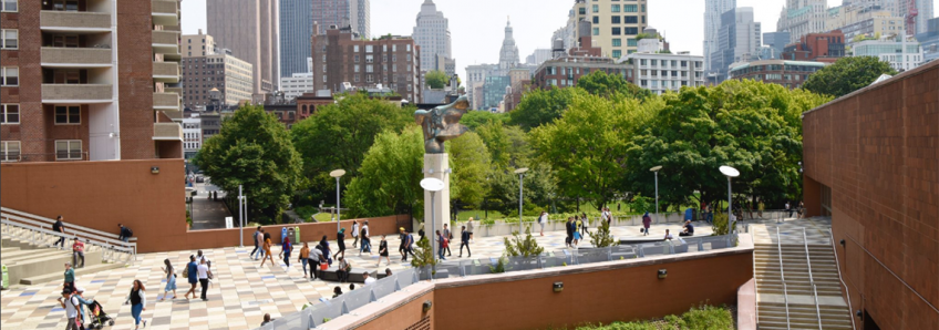 students walking across the BMCC campus