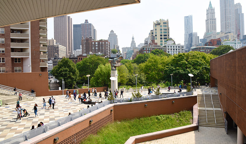 students walking across BMCC campus