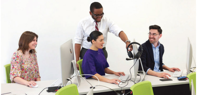 students at computers in classroom