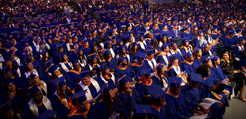 graduates in auditorium