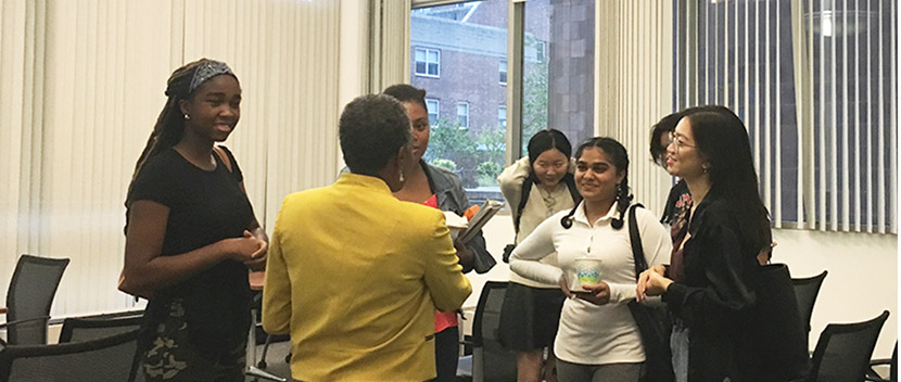 several women having a discussion