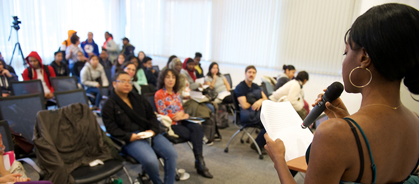 student speaking in front of audience