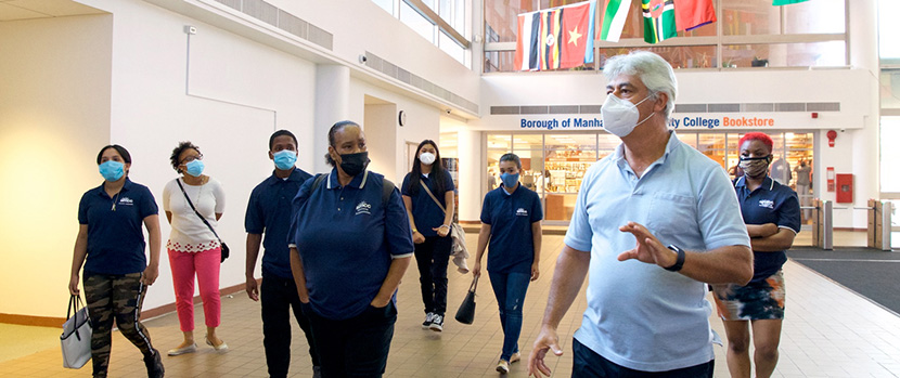 student ambassadors walking through BMCC lobby