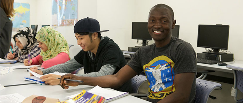 students in classroom studying English