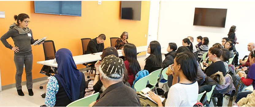 group of students listening to a speaker