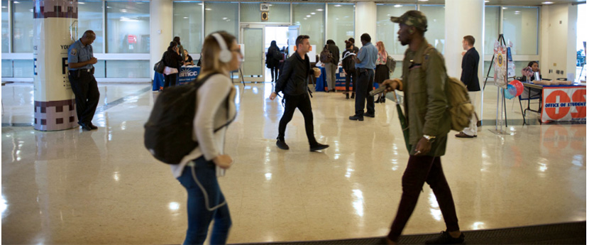 students walking in building lobby