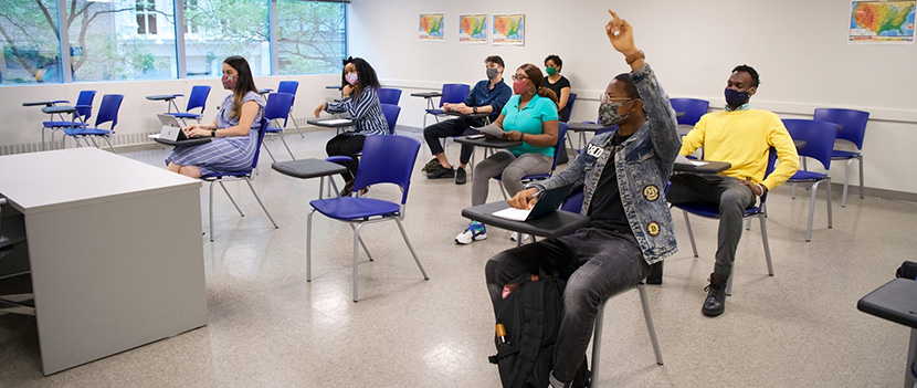 students in classroom distanced from each other