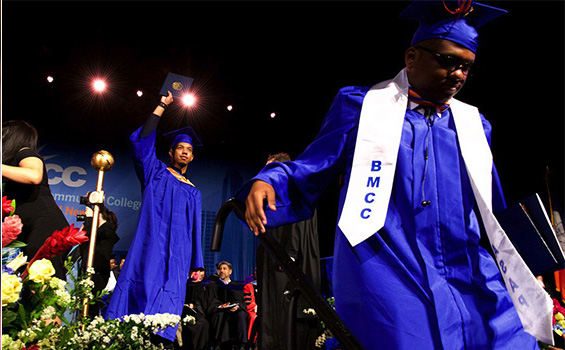 students in walking in graduation ceremony