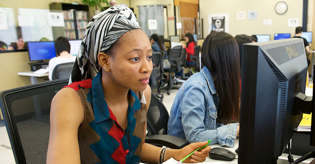 woman student using computer